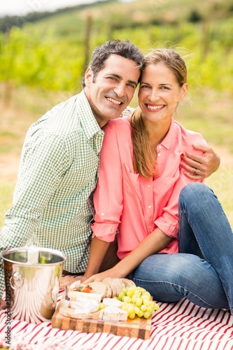 Portrait of happy couple relaxing on a blanket