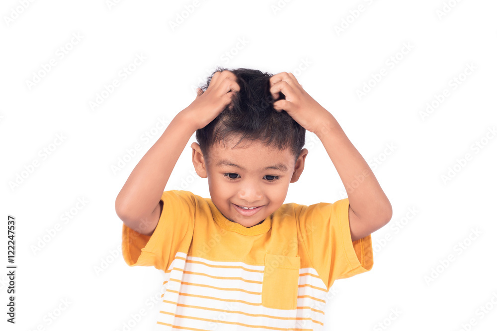 Cute child asian little boy scratching head