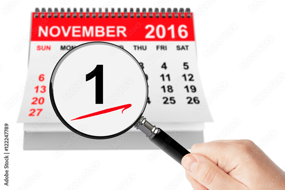All Saints Day Concept. 1 November 2016 calendar with magnifier All Saints Day Concept. 1 November 2016 calendar with magnifier