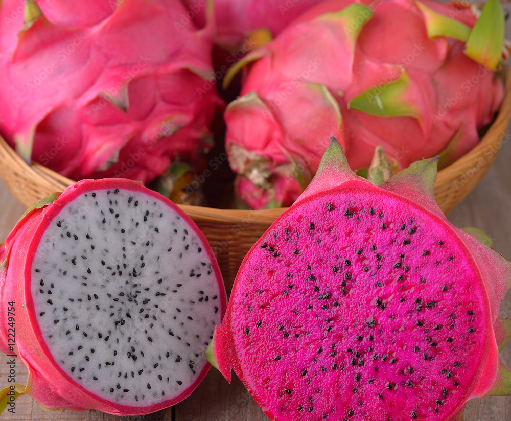 Dragon fruit on wooden background Dragon fruit on wooden background
