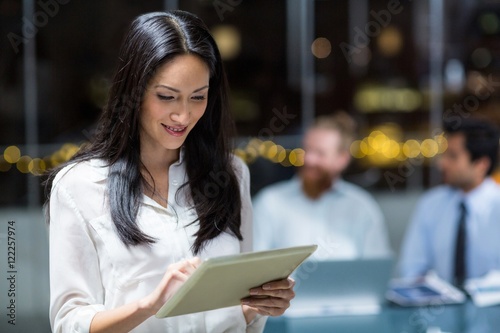 Businesswoman using digital tablet