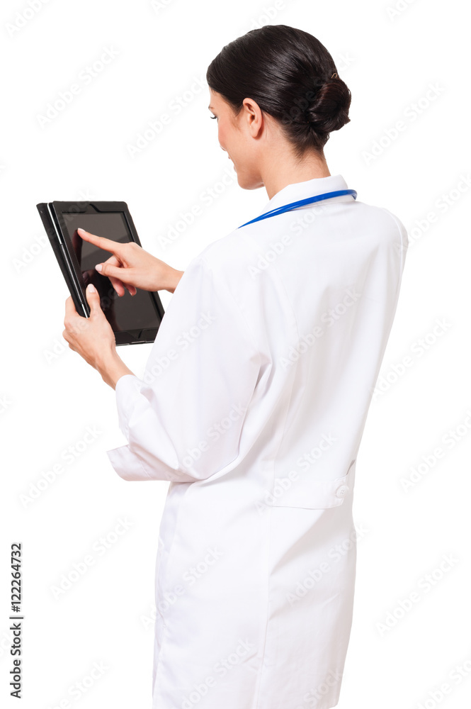 Rear over the shoulder view woman female doctor in white lab coat with digital tablet isolated on white background Rear over the shoulder view woman female doctor in white lab coat with digital tablet isolated on white background