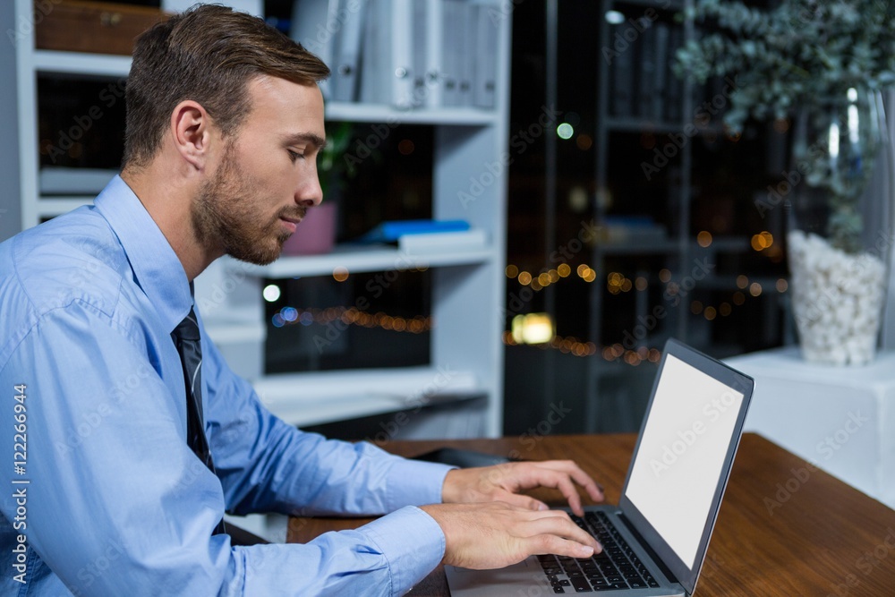 Businessman working on laptop Businessman working on laptop
