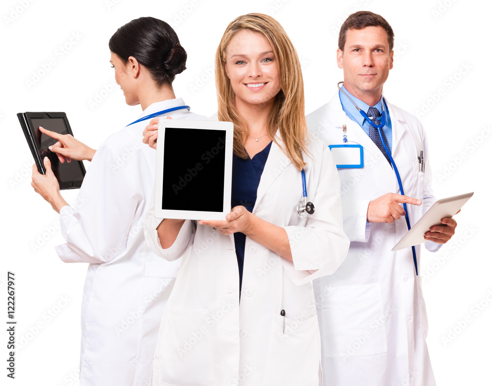 Doctors nurses with digital tablets isolated on white background Doctors nurses with digital tablets isolated on white background