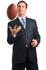 Male man businessman throwing tossing American football on isolated on white background