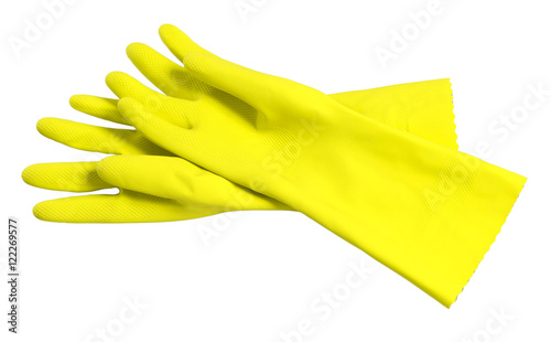 Pair of yellow rubber washing cleaning gloves isolated on white background photo