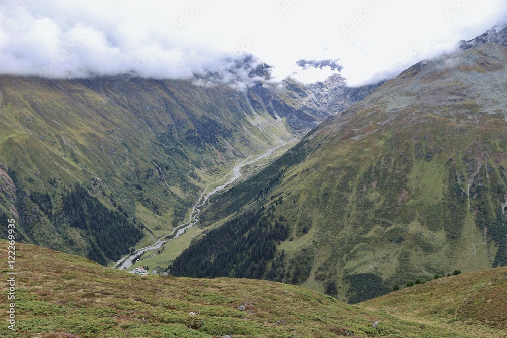 The Oetztal alps in Tyrol, Austria. View of the Pitztal valley with river Pitze and of the mountains and Pitztal glacier.