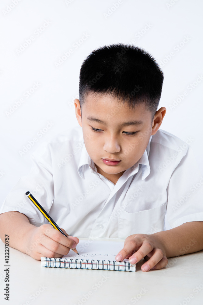 Asian Chinese Little Boy Wearing Student Uniform Writting Homewo Asian Chinese Little Boy Wearing Student Uniform Writting Homewo