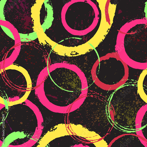 Seamless pattern with grunge colourful circles and splash on dar