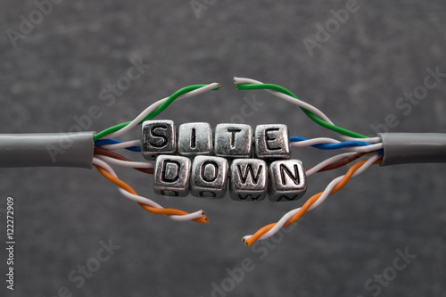 Site down text for website maintenance with grey background