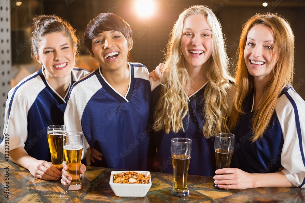 Group of friends having glass of beer in party Group of friends having glass of beer in party