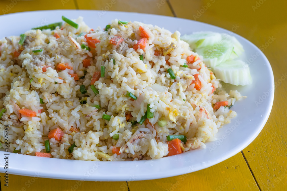 Fried rice with crab on white dish. Fried rice with crab on white dish.