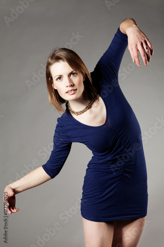 Girl in the studio with blue dress