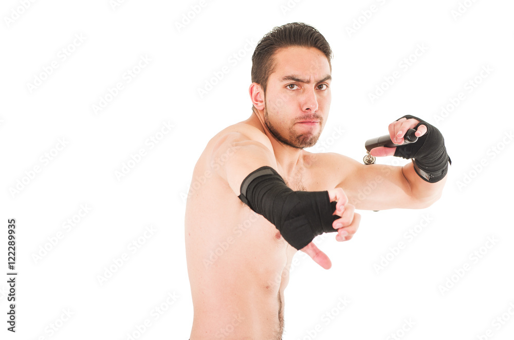 tough martial arts fighter wearing black shorts and wristband