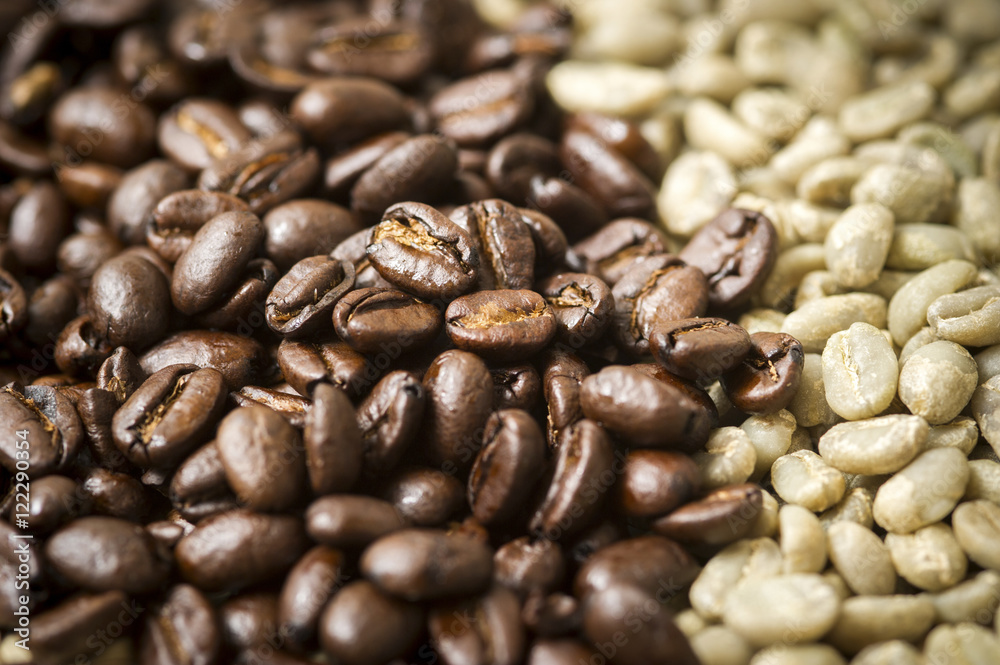 Detail of unroasted green coffee beans and brown roasted beans, Takoma Park, Maryland, United States of America Detail of unroasted green coffee beans and brown roasted beans, Takoma Park, Maryland, United States of America
