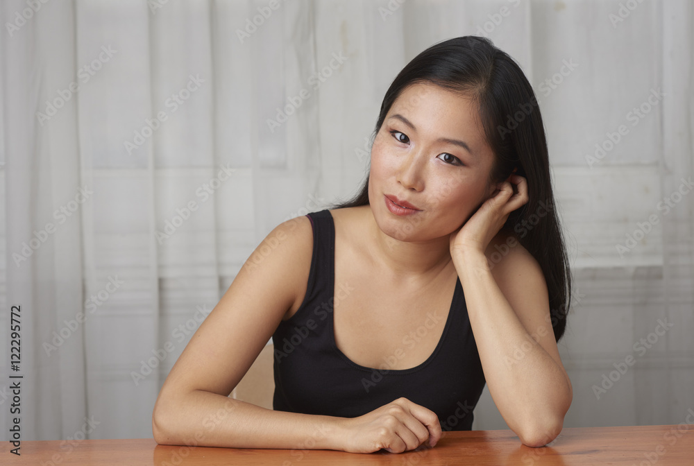 Young Attractive Asian Woman Sitting for Portrait Young Attractive Asian Woman Sitting for Portrait