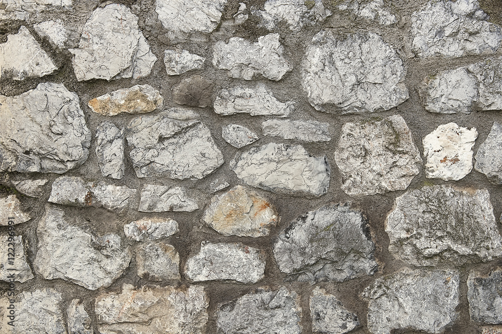 Old grey stone wall background texture Old grey stone wall background texture