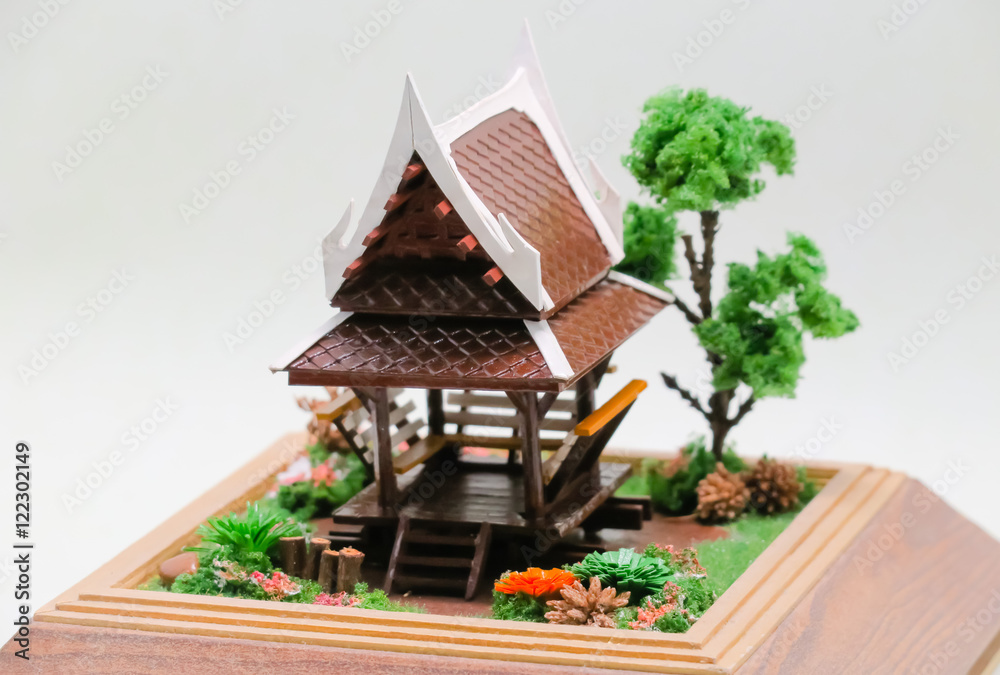 Small thai house style model. Thai house style model. Thai house isolated on white