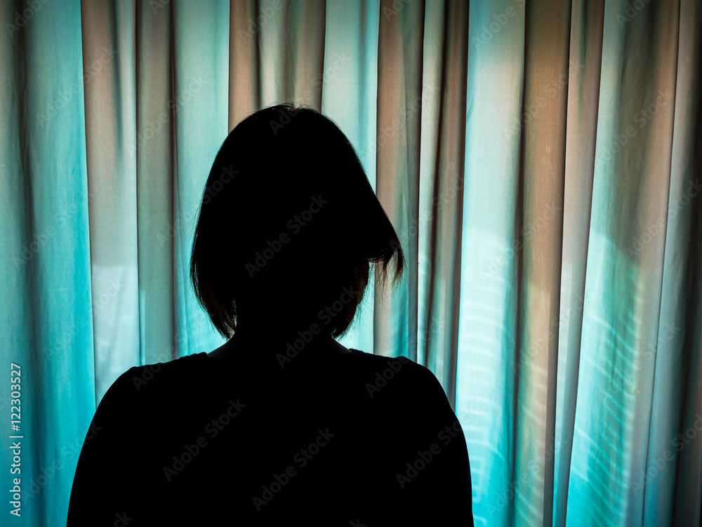 Silhouette serious woman