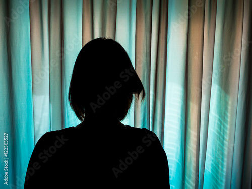 Silhouette serious woman