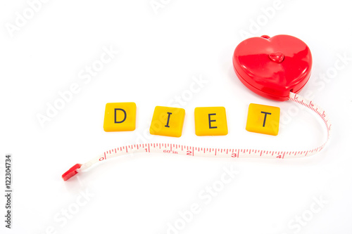 measure tape red heart shape with plastic letter diet isolated on white ,abstract background for diet or lose weight concept.
