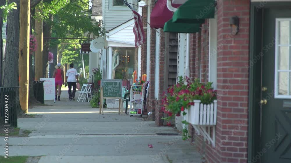 Main street in a small town as people walk around