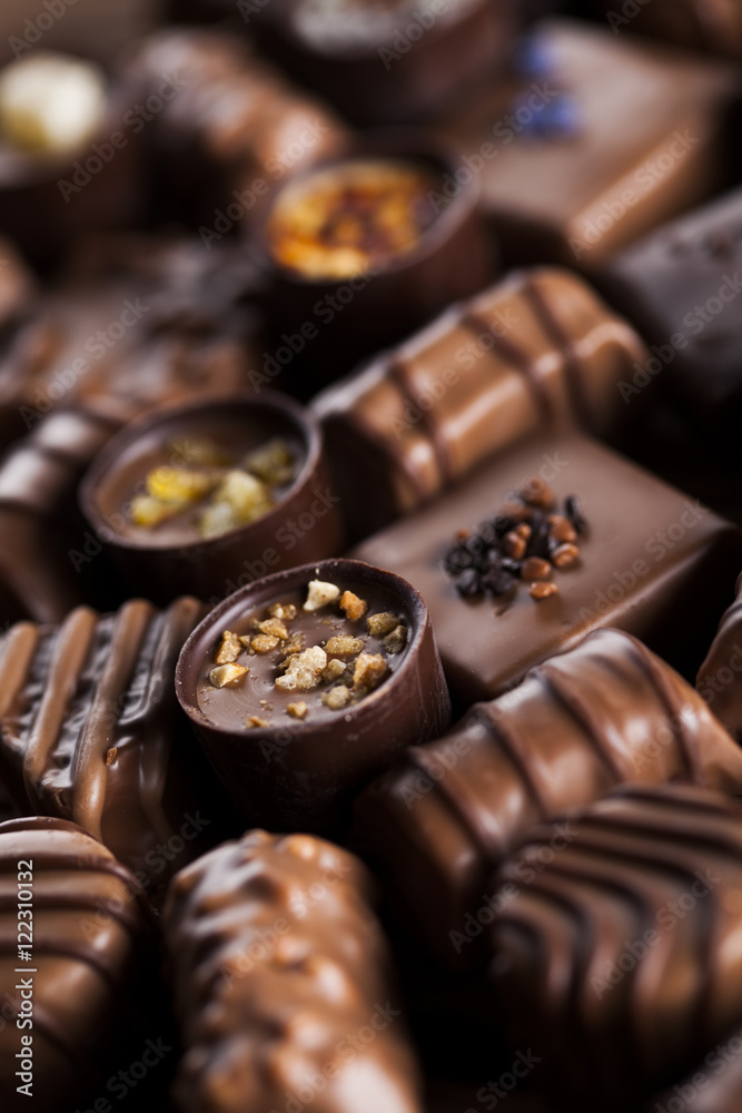Praline Chocolate on wooden backgroud Praline Chocolate on wooden backgroud