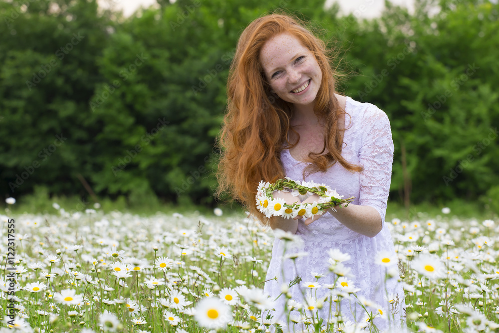 Beautiful woman enjoying daisy field, nice female in the meadow of flowers, pretty girl relaxing outdoor, having fun,holding plant, happy young lady and spring green nature, harmony concept Beautiful woman enjoying daisy field, nice female in the meadow of flowers, pretty girl relaxing outdoor, having fun,holding plant, happy young lady and spring green nature, harmony concept