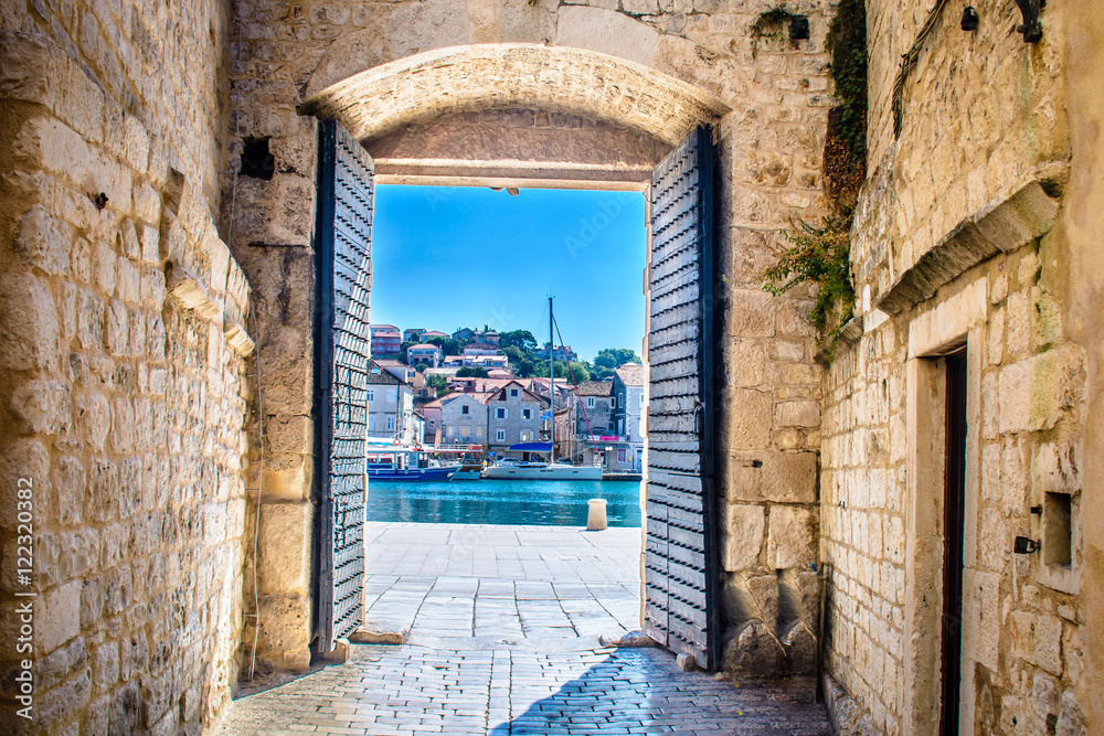 Naklejka premium City gate Trogir. / View at mediterranean town Trogir in Croatia, Europe.