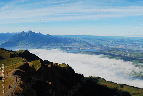 Stunning view of the Pilatus above the clouds from top of Rigi mountain, Lucerne, Switzerland. Beutiful Rigi Kulm.