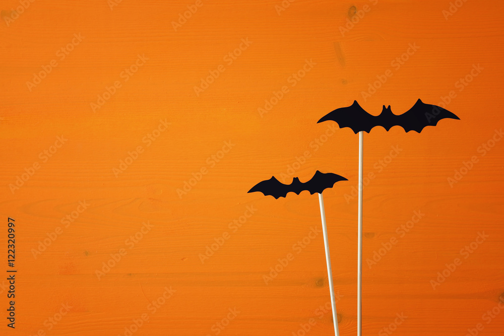 Naklejka premium Halloween holiday concept. Funny paper bats