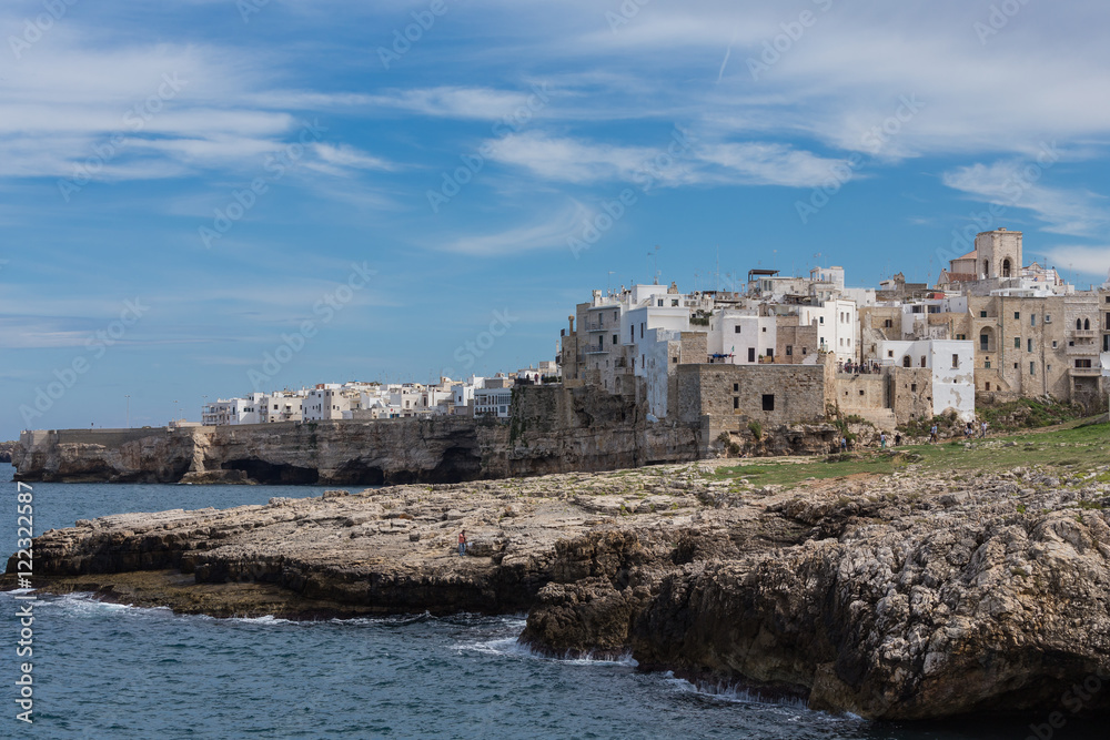 Panoramic view of buildings built on rocks in Polignano a Mare, Puglia - Italy