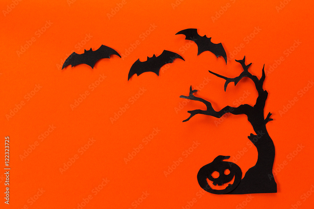 Halloween holiday background with tree, pumpkin and bats cut bla