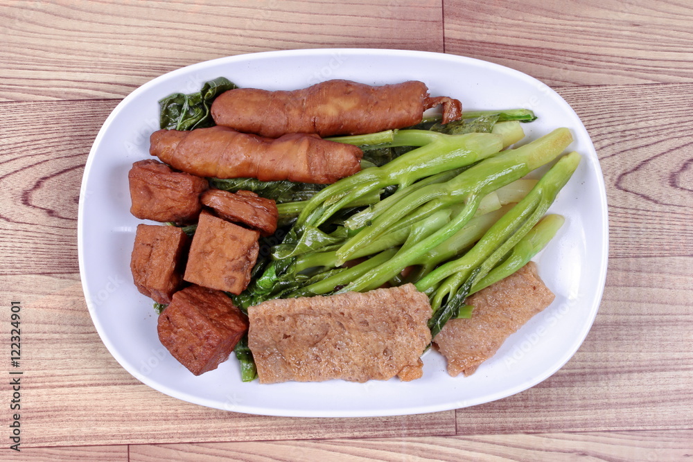 Chinese Vegetable festival food as fried Kale with fermented flours. Chinese Vegetable festival food as fried Kale with fermented flours.