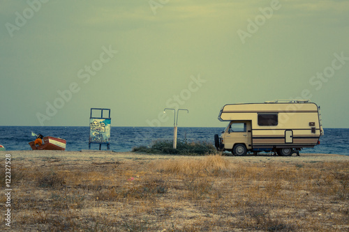 Camper van on the beach photo