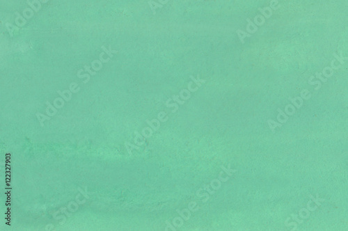 The sheet of paper is painted out by a green gouache. Background