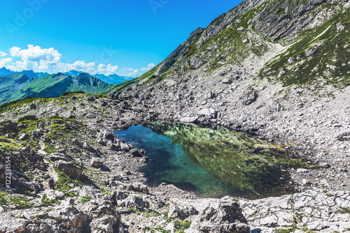 Fototapeta Naklejka Na Ścianę i Meble -  Stagnant pool of water near mountain top