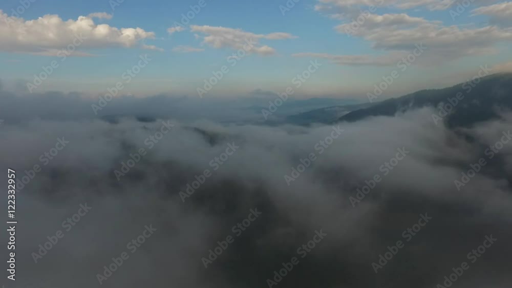 fog in the mountains at sunrise fog in the mountains at sunrise