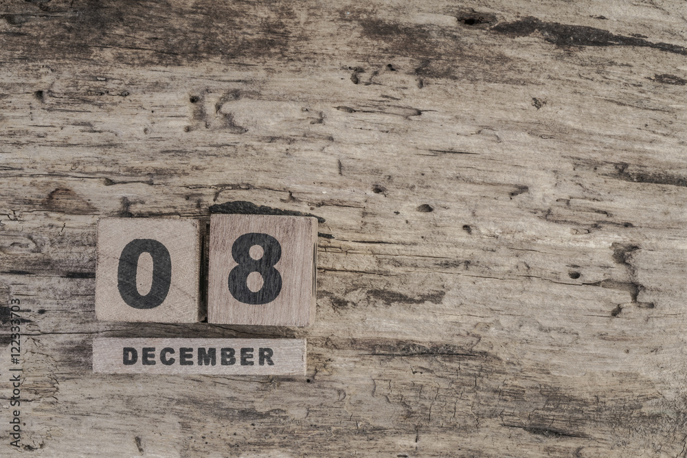 cube calendar for december on wooden background with copy space cube calendar for december on wooden background with copy space