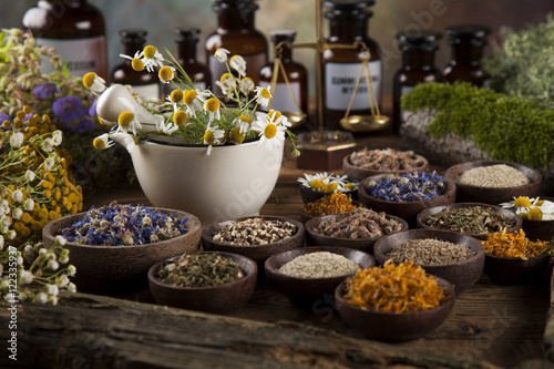 Natural medicine on wooden table background