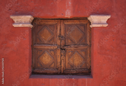 Old histiric window with woden shutters photo