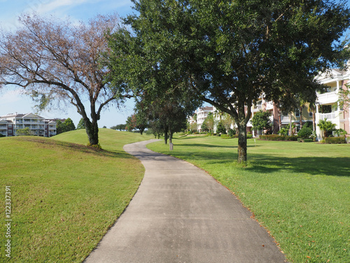 macadam path by a golf course