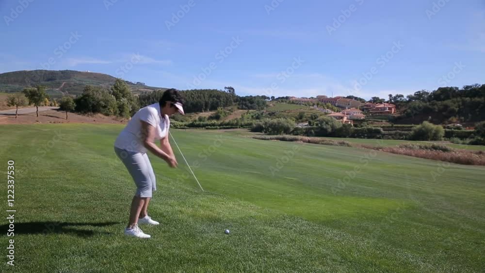 Attractive Mature woman plays Golf at the country club. Attractive Mature woman plays Golf at the country club.