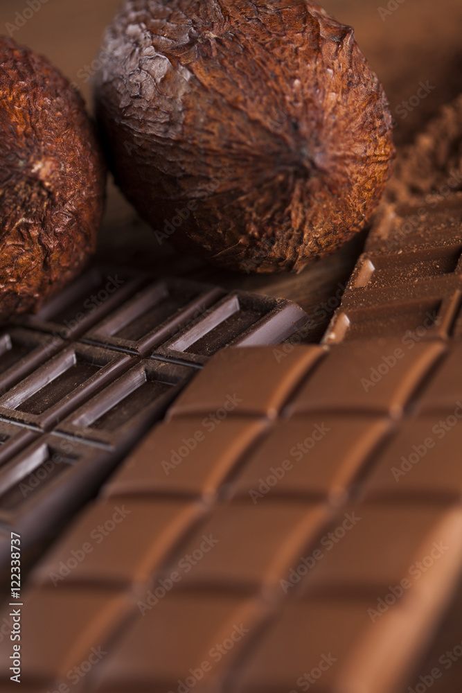 Chocolate sweet, cocoa pod and food dessert background