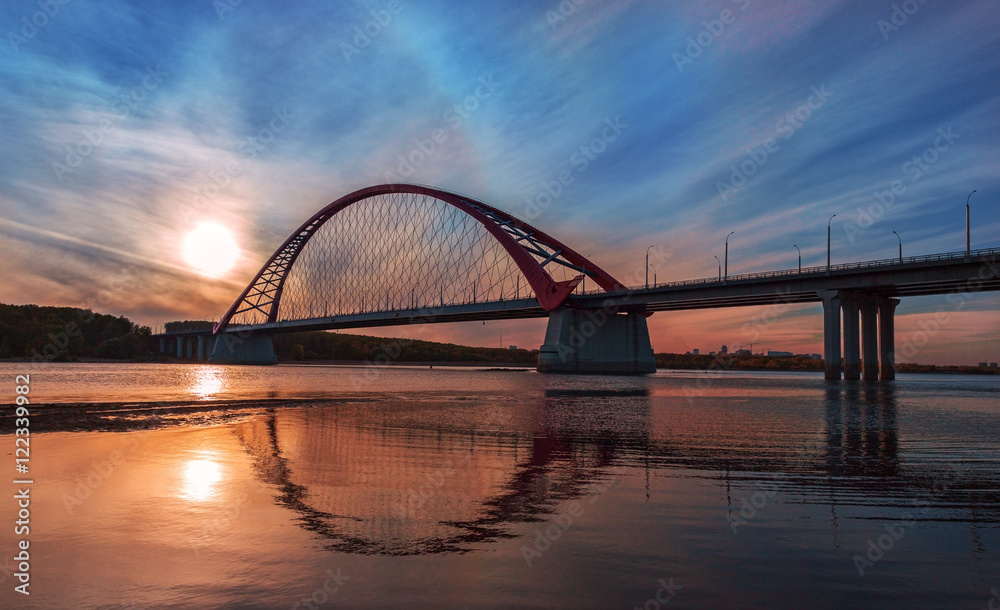 Naklejka premium Autumn evening on the Ob river near the new bridge. Novosibirsk.