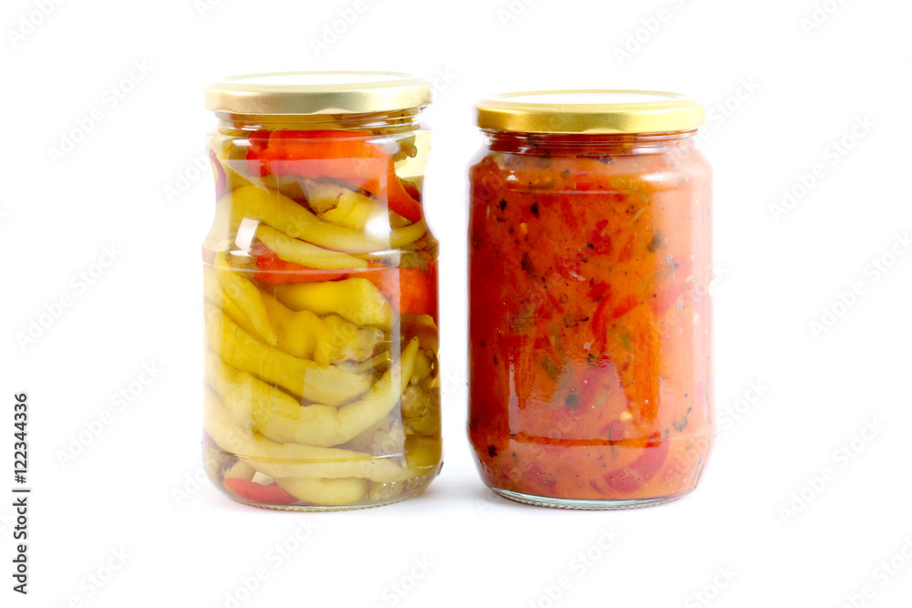 picture of a Traditional Macedonian food Luteniitza in jar and chilli paprika in jar. homemade product picture of a Traditional Macedonian food Luteniitza in jar and chilli paprika in jar. homemade product