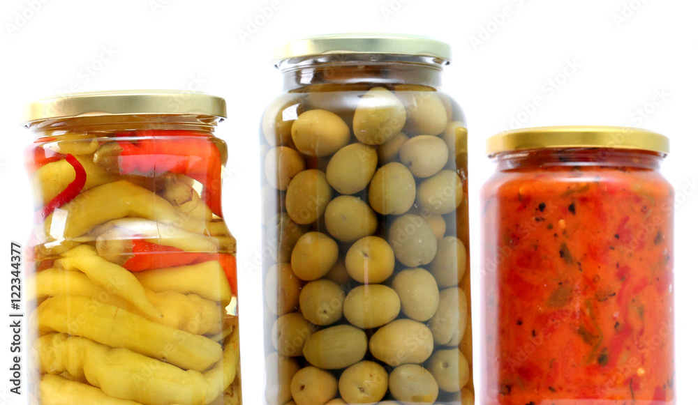 Traditional Macedonian food Luteniitza in jar , chilli paprika and olives in jar. homemade product Traditional Macedonian food Luteniitza in jar , chilli paprika and olives in jar. homemade product