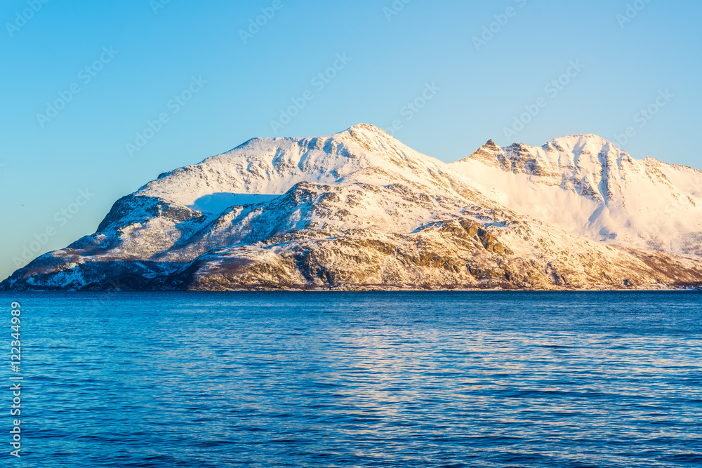 Norwegian Snow Mountains with Fjord close to Tromso