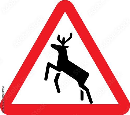 Road sign warning about the possible presence of animals on the road and in close proximity to 