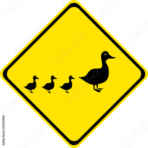 Road sign warning about the possible presence of animals on the road and in close proximity to   